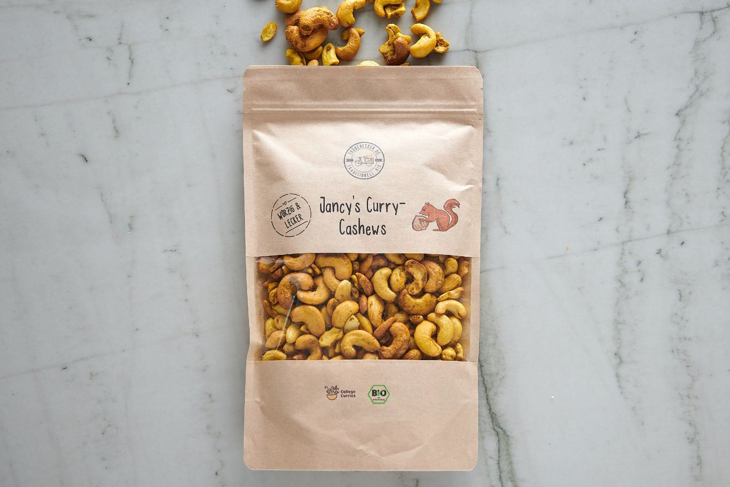 Jancy’s Curry Cashews Bio