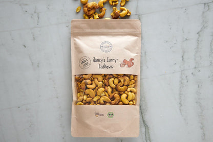 Jancy’s Curry Cashews Bio